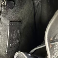 COACH ブラック レザーバックパックの画像