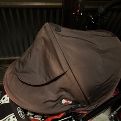 ベビーカーとアンパンマンよくばりビジーカーの画像