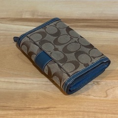 コーチ　二つ折り財布　の画像