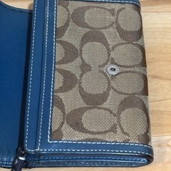 コーチ　二つ折り財布　の画像