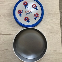 ミャクミャクボールペンと菓子缶セットの画像