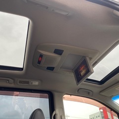 サンルーフ★ライダー★黒革シート★後席フリップダウンモニター★両側電動パワースライドドア★Bluetooth★大型リヤウィングスポイラーの画像