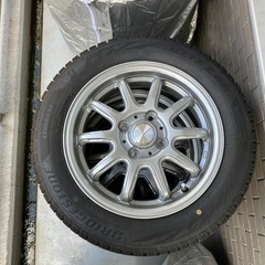 スタッドレスタイヤ 安心のブリヂストン ブリザック（ホイール付き）軽自動車用４本 美品 屋根下保管 カバー
付き155/65R14の画像