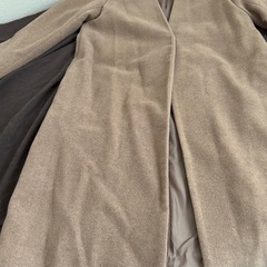 ベージュ　コートの画像