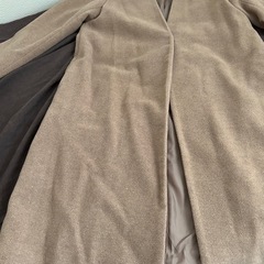 ベージュ　コートの画像