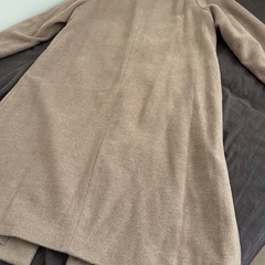 ベージュ　コートの画像