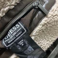 GUESS フリースジャケットゲス リバーシブル フェイク レザージャケットの画像