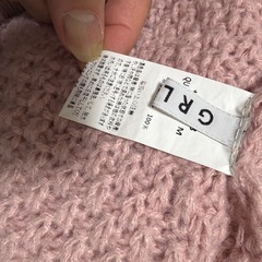 タイトル：ピンクのニットカーディガン（ポケット付き）の画像