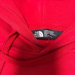 ノースフェイスフードパーカーの画像