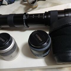 フィルムカメラ2台と望遠レンズ各種の画像