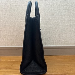 マイケルコース　ブラック　ハンドバッグ　ミレラ　チャーム付きの画像