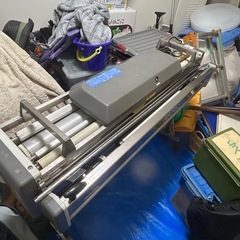 クロス自動糊付け機の画像