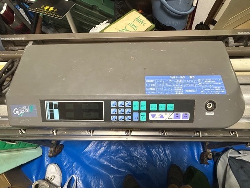 クロス自動糊付け機