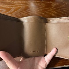 COACH 折りたたみ財布 の画像