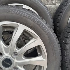 タント スタッドレスタイヤ ホイール付きの画像