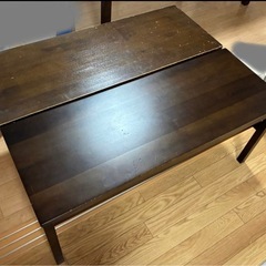 ダークブラウン木製ダイニングテーブルの画像