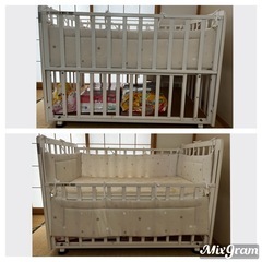 ベビーベッド（ベッドガード付）の画像