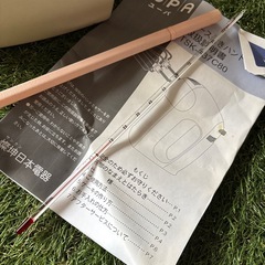ケース付き　ハンドミキサーと温度計の画像