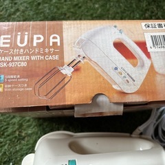 ケース付き　ハンドミキサーと温度計の画像