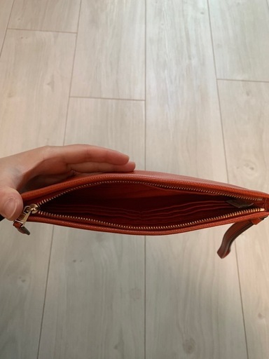 ほぼ新品】コーチのリストレット/ポーチ（朱色/赤色/オレンジ/レッド