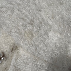 お花ボタンの毛むくじゃらカーディガンの画像