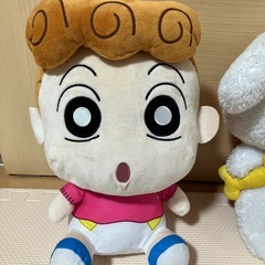 ひまわりとシロのぬいぐるみの画像