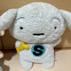 ひまわりとシロのぬいぐるみの画像