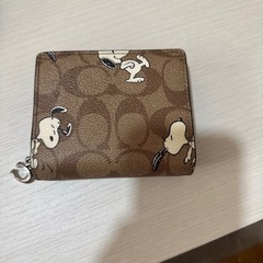COACH スヌーピー2つ折り財布の画像