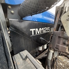 ニューホーランドTM125フロントローダー付き　スーパーステア　タイヤも新しくメーカーでメンテナンス済み！アワー6640h 実働現状販売の画像