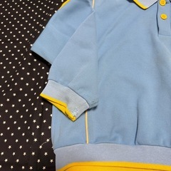 水色と黄色のポロシャツスタイルのジャージ、体操服　サイズ110、中古品で使用感あり。の画像