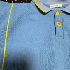 水色と黄色のポロシャツスタイルのジャージ、サイズ110、中古品で使用感あり。の画像