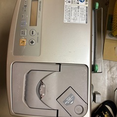 都市ガスファンヒーターと灯油ストーブ二つの画像