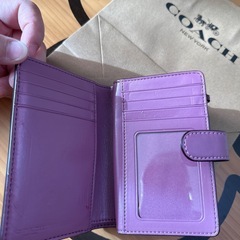 コーチ折りたたみ財布の画像