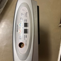 都市ガスファンヒーターと灯油ストーブ二つの画像