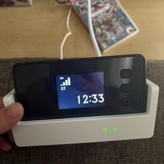UQモバイルポケットWiFiとクレードルの画像