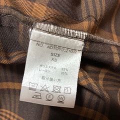 ボタンシャツの画像