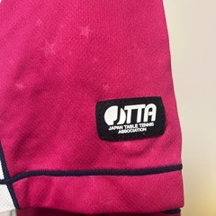 asics トップスの画像