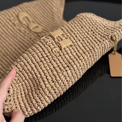 COACH 編み込みトートバッグ ベージュの画像