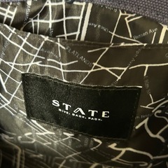 STATE ネイビー バックパックの画像