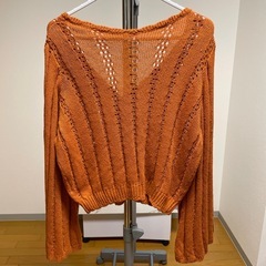 オレンジのカーディガン〘ホームクリーニング済み〙の画像