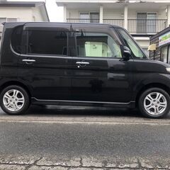 タントカスタムRS　４WD　パワースライドドア・エンジンスターター・TV・ナビ　人気のブラック　スタッドレスタイヤ交換済みの画像