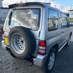 コミコミ価格 車検フル満タン 背面タイヤ 三菱 パジェロミニの画像