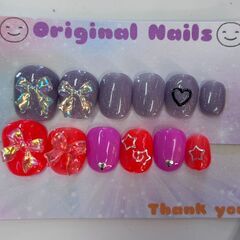 ハンドメイドネイルチップ　オレンジ うす紫リボン 星 ハート キッズ向けの画像