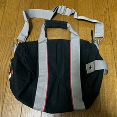 TOMMY HILFIGERキャンバス素材のミニボストンバッグの画像