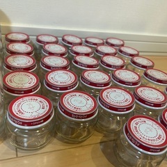 キューピーの空き瓶28個とその他空き瓶4個の画像