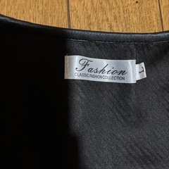 格子柄パンツスーツ
の画像