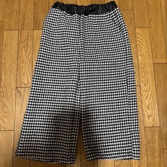 格子柄パンツスーツ
の画像