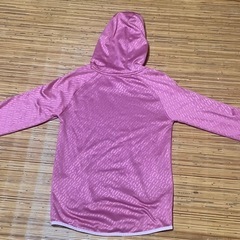 【中古】Under Armour キッズパーカー フード付き　サイズYLG ピンクの画像