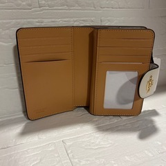 コーチ　アウトレット　二つ折り財布　汚れあり商品の画像