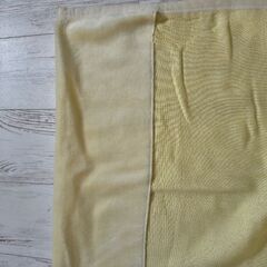 薄黄色の敷ふとん毛布の画像